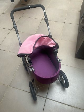 Carrito de muñecas morado y rosa