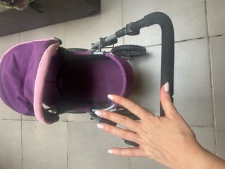 Carrito de muñecas morado y rosa