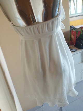 Vestito bianco a balze