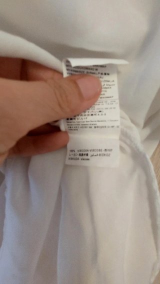 Camisa fluida Benetton con etiqueta.