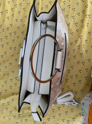 Bolso de mano efecto piel serpiente