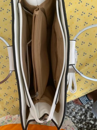 Bolso de mano efecto piel serpiente