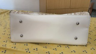 Bolso de mano efecto piel serpiente