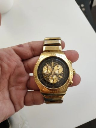 Swatch 007 Oro Cronógrafo