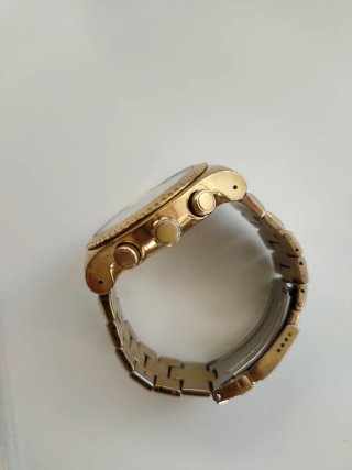 Swatch 007 Oro Cronógrafo