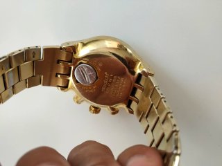 Swatch 007 Oro Cronógrafo