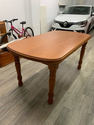 Mesa de comedor extensible de madera