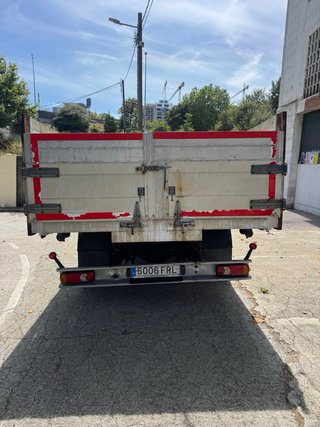 Camión grúa y volquete Nissan 70.14