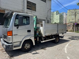 Camión grúa y volquete Nissan 70.14