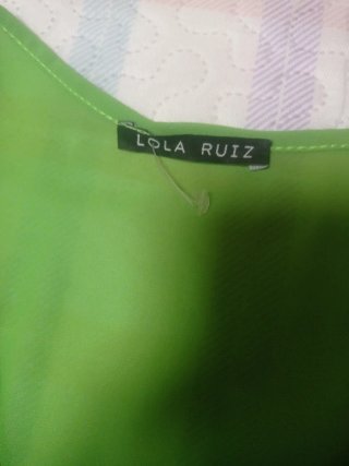 Vestido verde con lunares blancos y otro un mono v