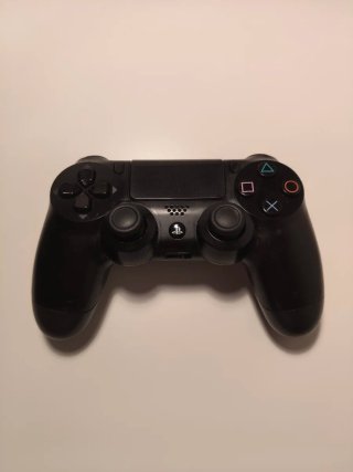 Console PS4 nera + 7 giochi