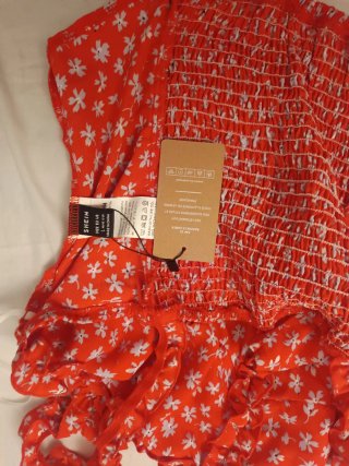 Camiseta muy bonita de tirantes flores color coral