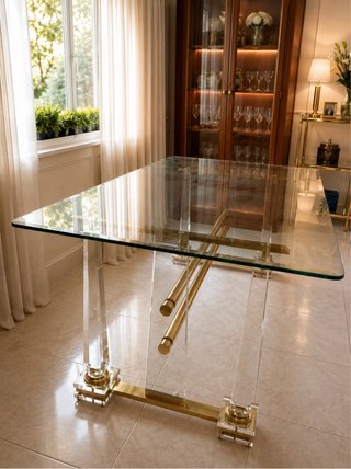 Mesa de comedor de cristal y metal dorado