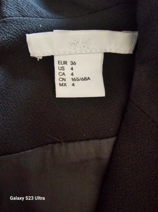 Mono negro estilo blazer