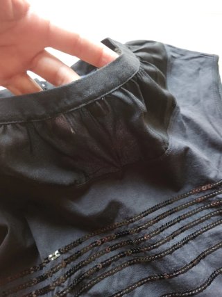 Top negro con lentejuelas
