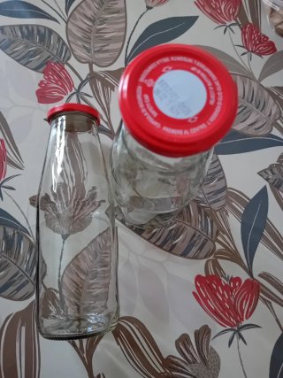 4 Bottiglie in vetro con tappo ermetico