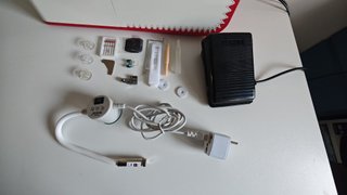 Máquina de coser Alfa Practika 9 en  blanco y rojo