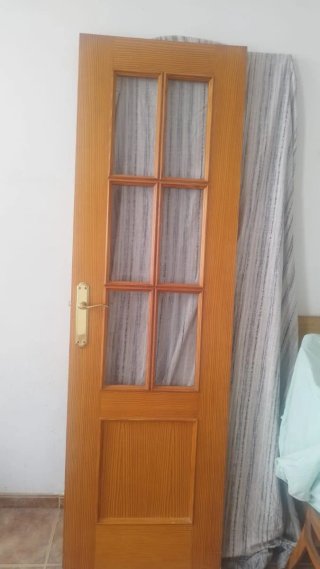 Puerta doble madera con cristales
