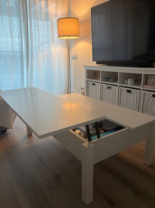 Mesa centro elevable blanca con almacenaje