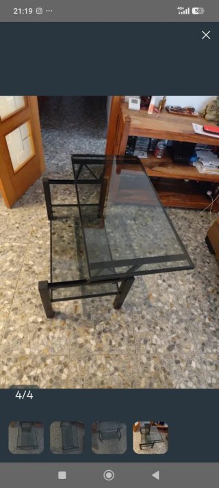 Mesa centro cristal negra y metal