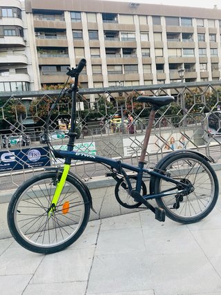 Bicicleta plegable Btwin azul y verde