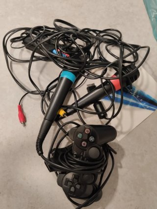 PlayStation 2 con Mando , 2 micrófonos y juegos