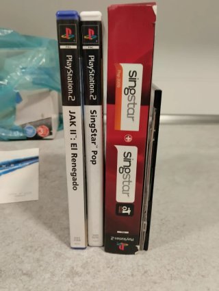 PlayStation 2 con Mando , 2 micrófonos y juegos