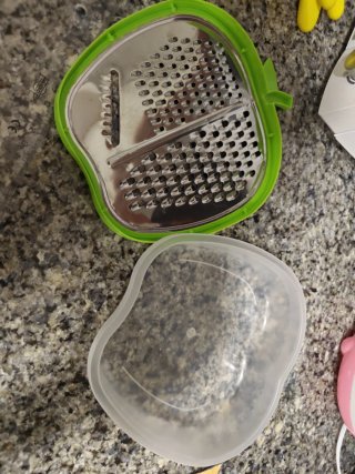 Rallador de cocina con forma de manzana