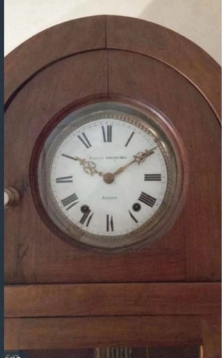 Reloj de pie antiguo de madera