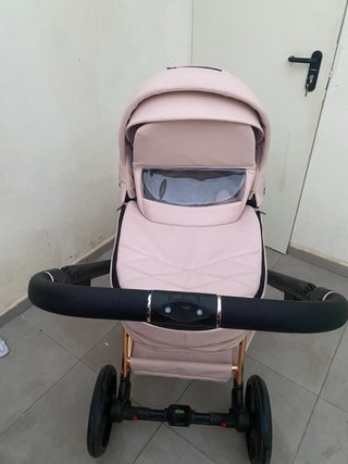 Carro de bebé rosa