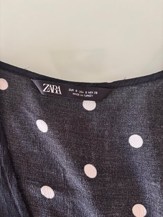 Blusa lunares negra