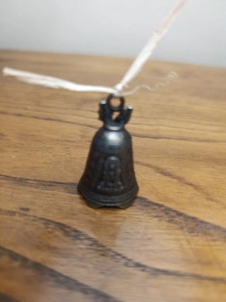 Buda, porta incienso, caja cerillas y campana