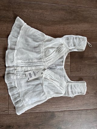 Blusa blanca con etiqueta talla L