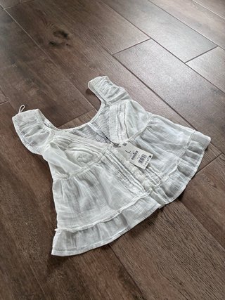 Blusa blanca con etiqueta talla L