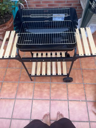 Barbacoa negra con funda