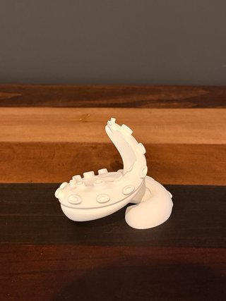 Soporte para mando PS5 en forma de tentáculo