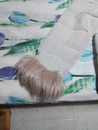 Abrigo de pelo sintético rosa y beige 18 €