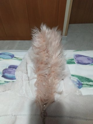 Abrigo de pelo sintético rosa y beige 18 €