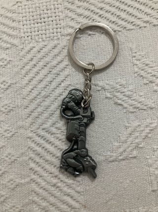 Llavero  del juego wizordum figura militar