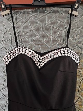 Tuta nera con dettagli argento