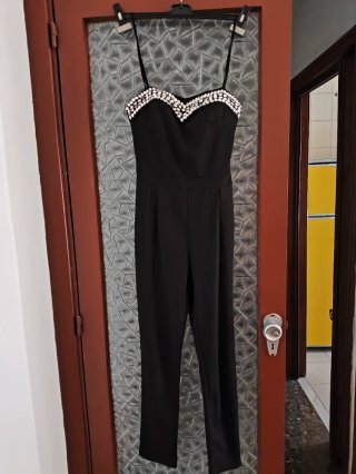 Tuta nera con dettagli argento