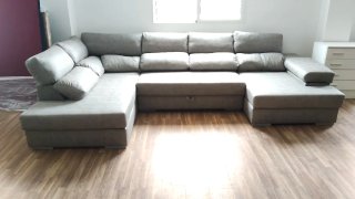 Divano modulare grigio in tessuto
