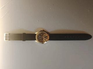 Reloj Guess Dorado Animal Print