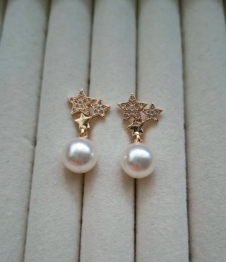 Orecchini a stella con perle