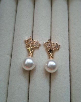 Orecchini a stella con perle