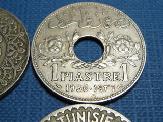 Lote 4 monedas antiguas con agujero