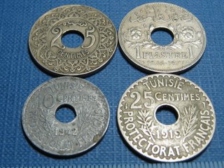 Lote 4 monedas antiguas con agujero