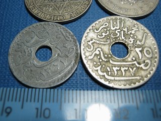Lote 4 monedas antiguas con agujero