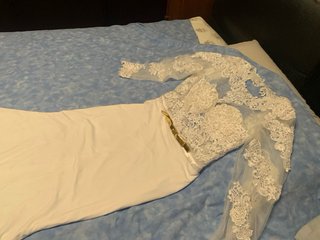 Abito da sposa pizzo manica lunga. Schiena scopert