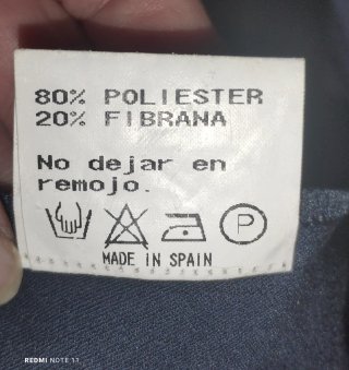 Chaqueta JOMHAY azul con botones dorados